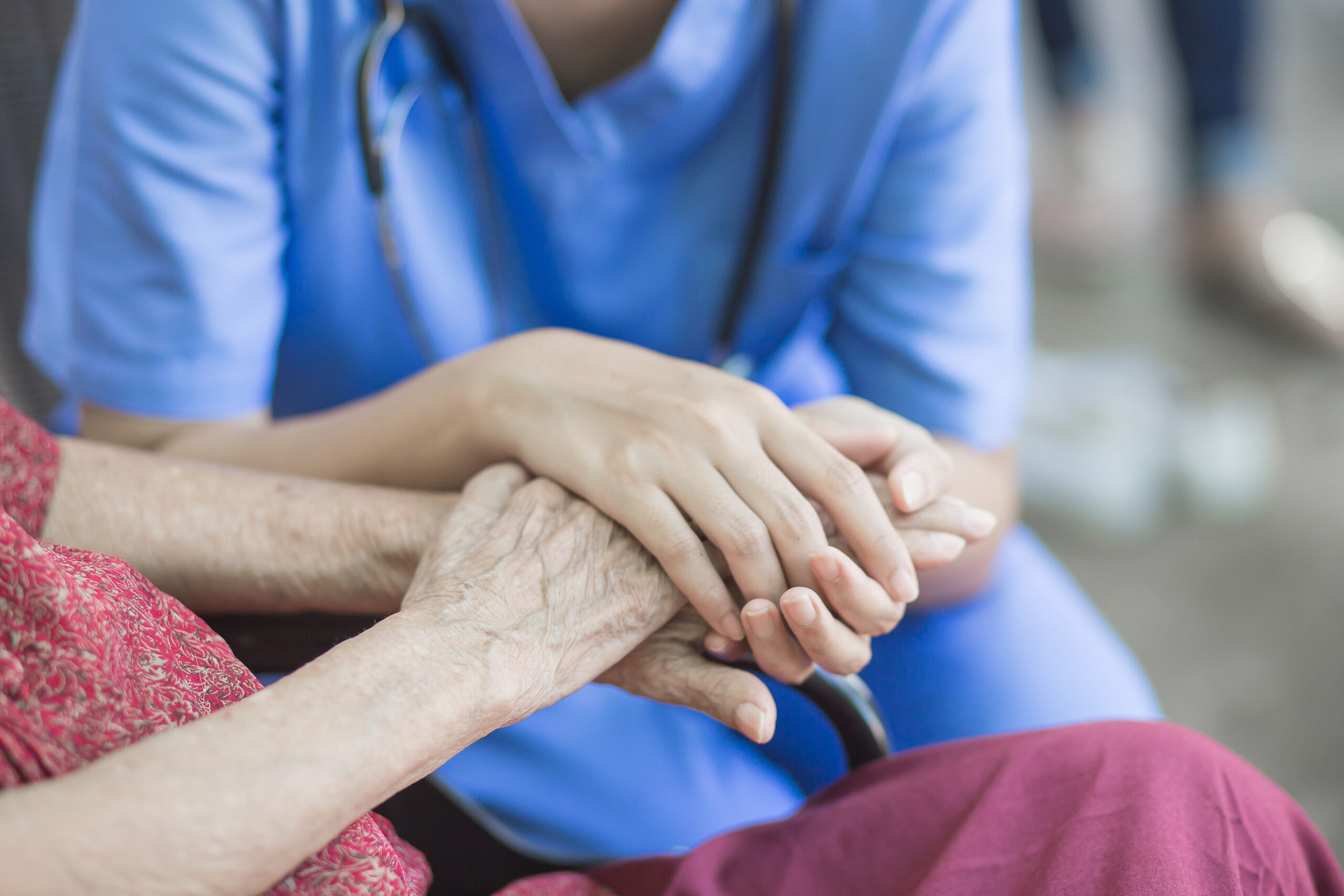 Compassionate Personal Caregiver assisting a senior